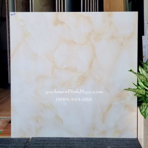 Gạch 60x60 sale bóng kính vân vàng