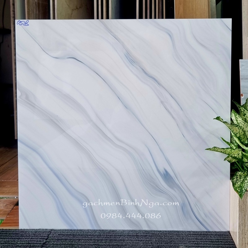 gạch sale 60x60 bóng kính vân xanh