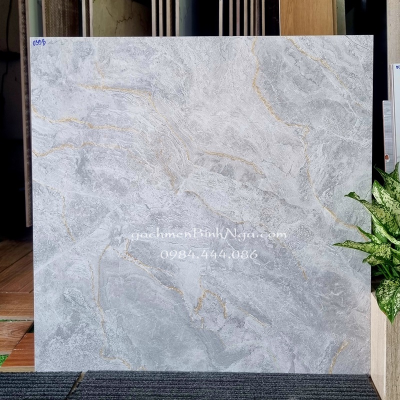 Gạch bóng kính 6060 sale màu xám vân đá giả khắc kim