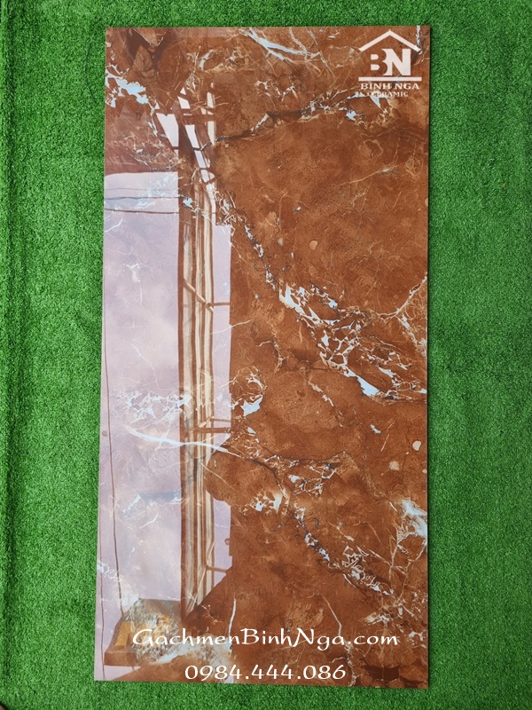 Gạch 60x120 cao cấp màu đỏ cam vân đá trắng siêu bóng