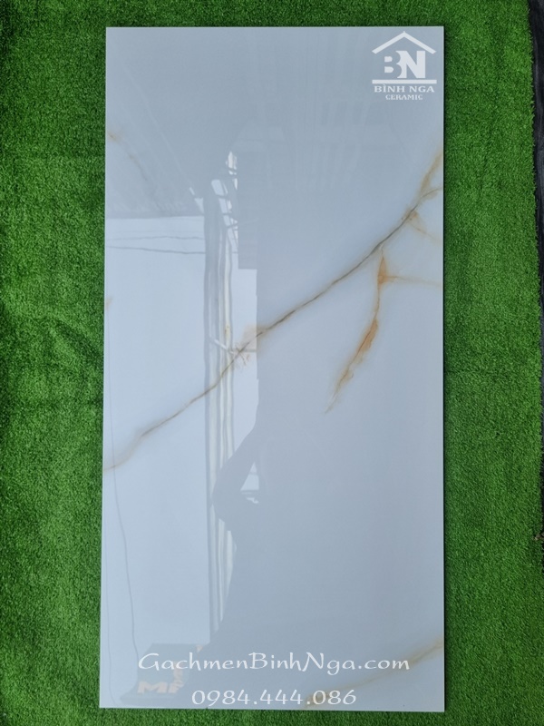 Gạch bóng kính 60x120 màu trắng vân vàng nhẹ cao cấp
